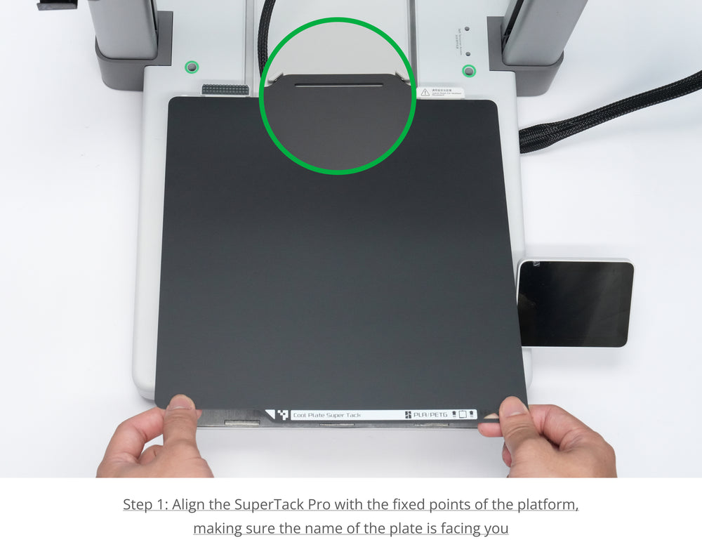 Step 1: Align the plate with the fixed points of the platform with the name of the plate facing you