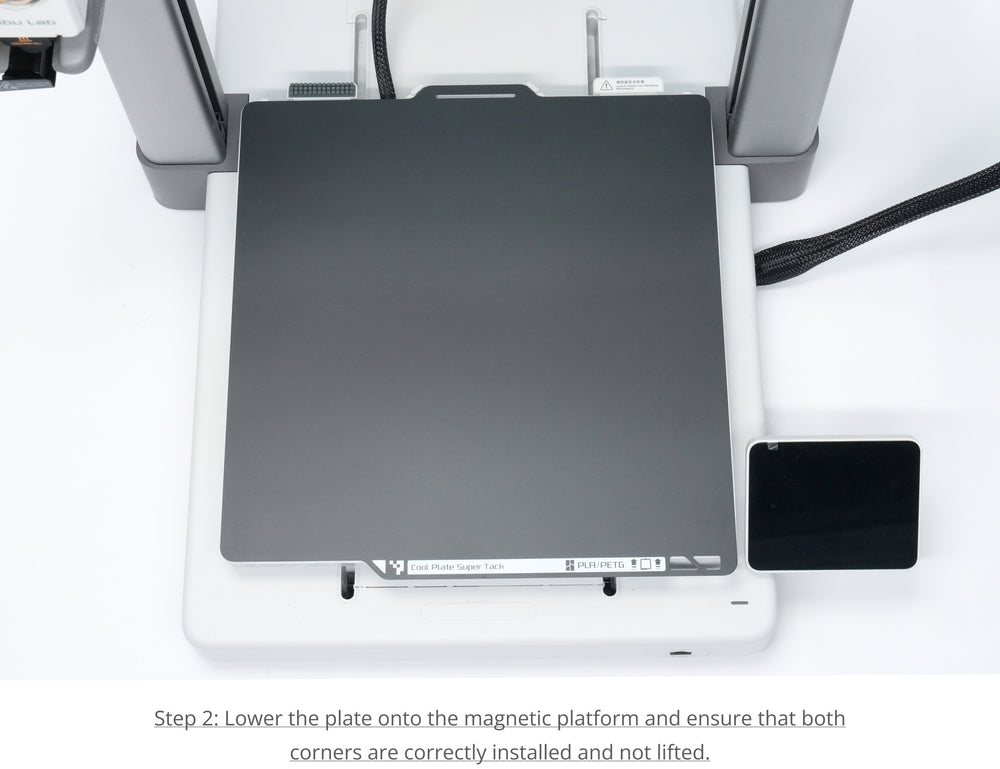 Step 2: Lower the plate and secure to the magnetic platform